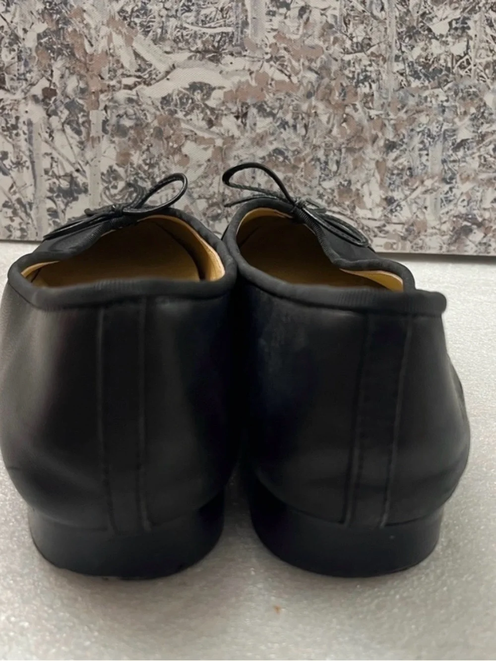 CHANEL Black Leather Ballet Flats with Bow and CC Motif
